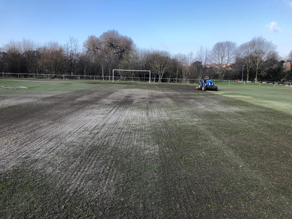 St Asaph FC debris removal after flooded pitch